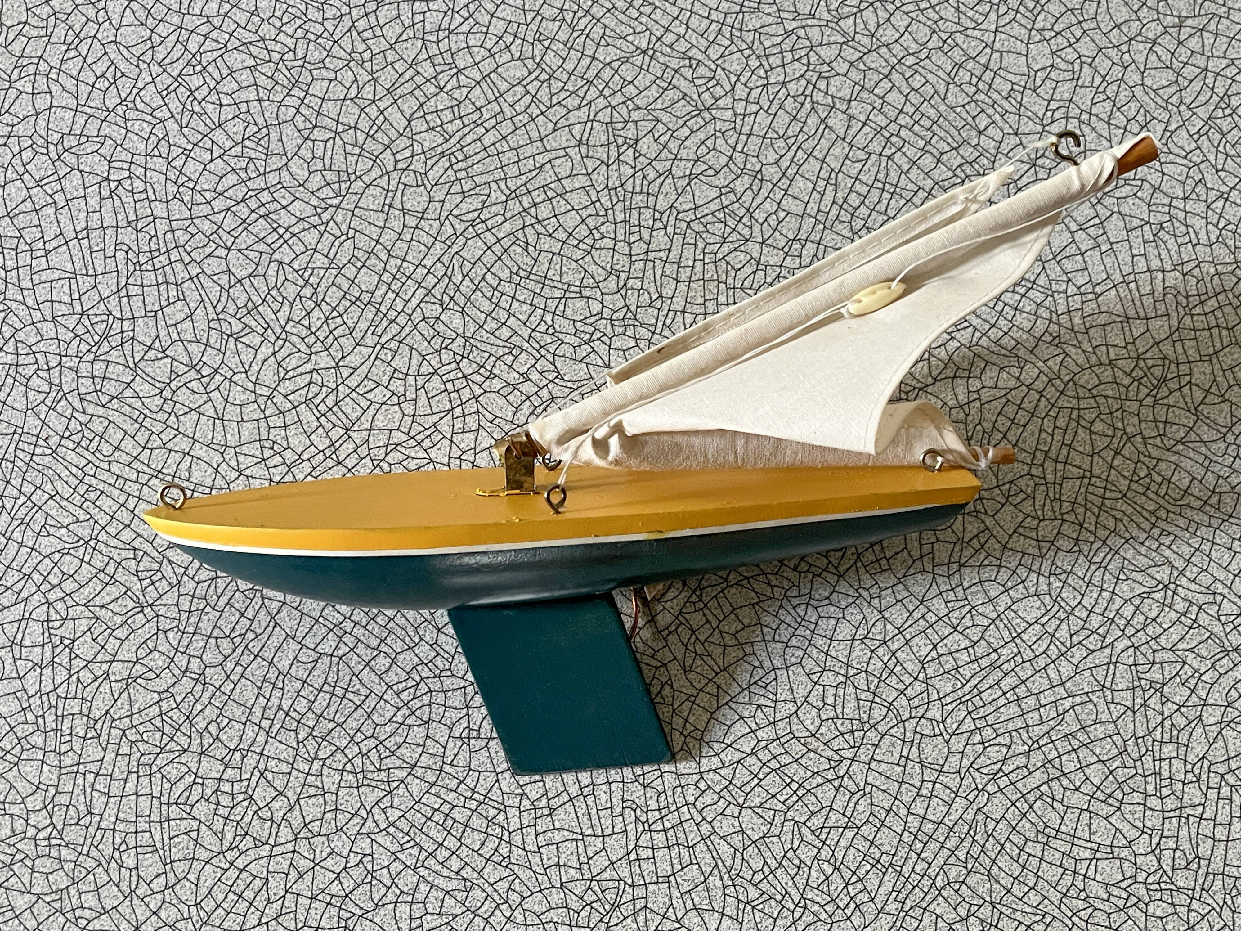 Small wooden sailboat, pretty colors