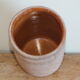 Ancien pot à graisse ou à miel en terre vernissée ocre