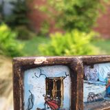Miroir ancien en verre inversé