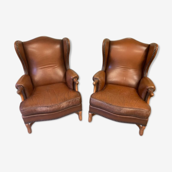 Pair of Jean Prévost eared armchairs