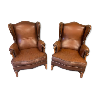 Pair of Jean Prévost eared armchairs