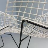Set of two Diamond chair by Harry Bertoia in white & black metal. 1960s