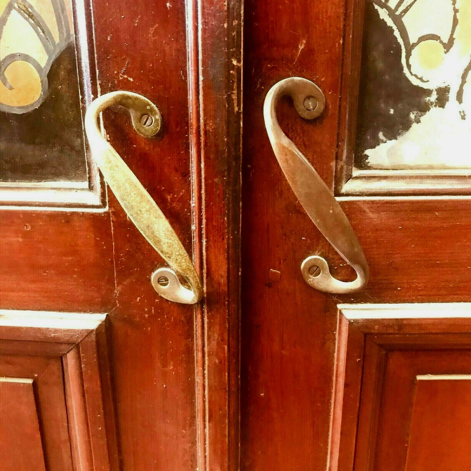 Pair of art deco doors in glass painted in imitation of 20th century stained glass
