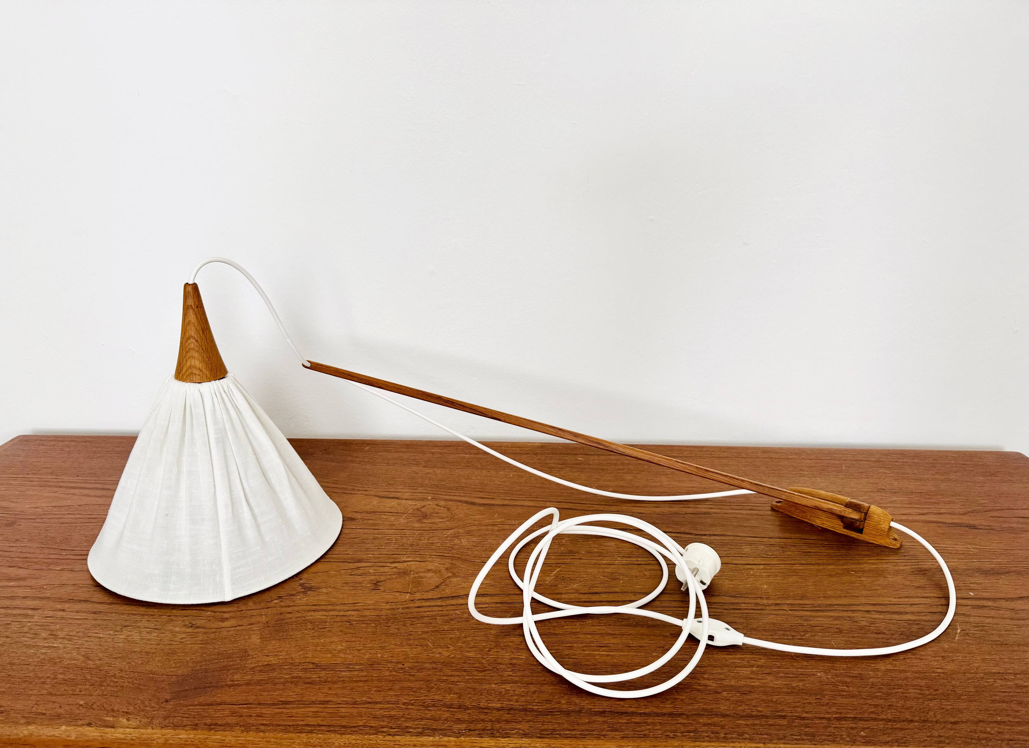 Danish Adjustable Oak Wall Lamp by Uno and Östen Kristiansson