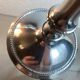 Pair of silver-plated metal candlesticks