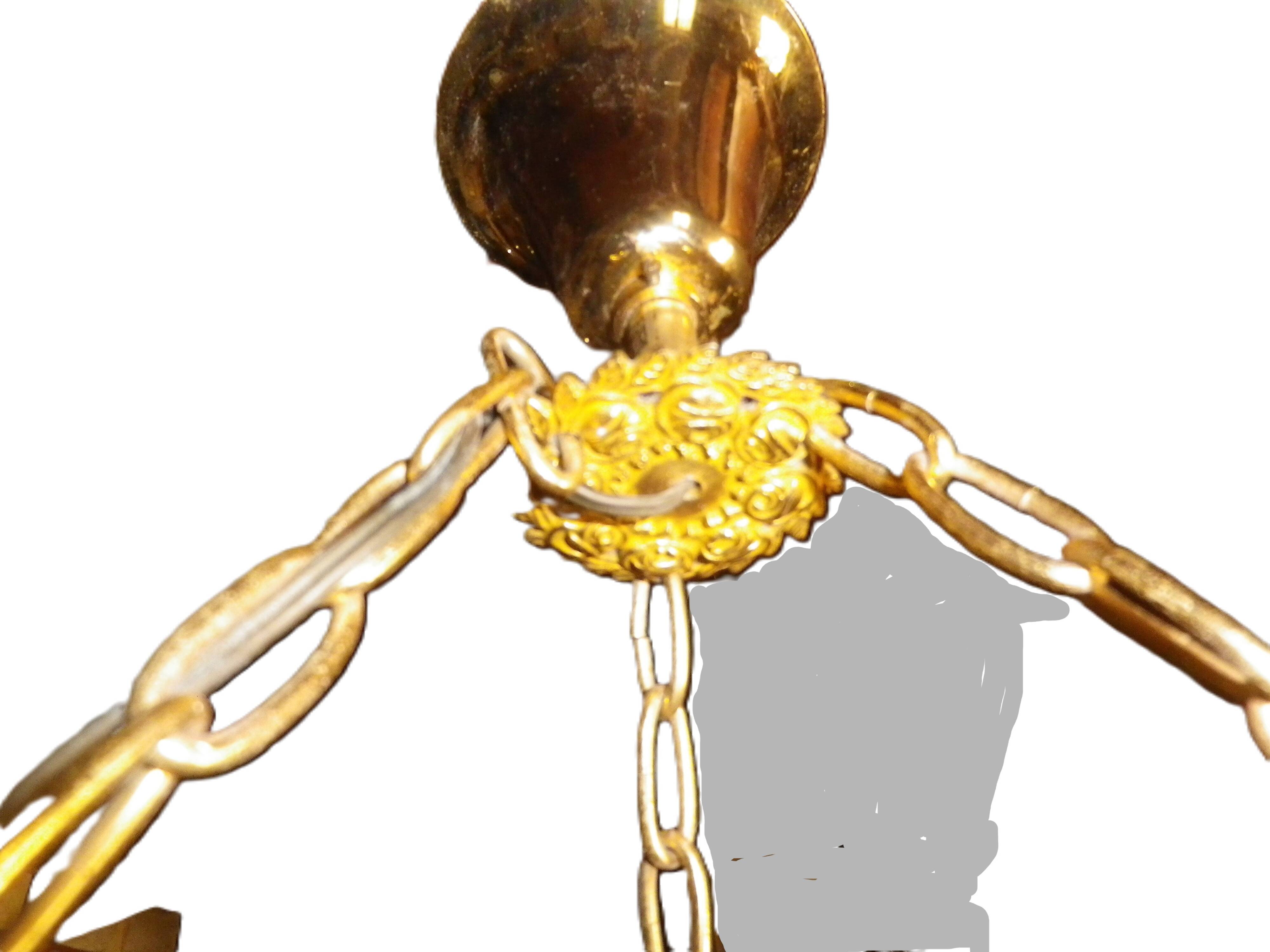 chandelier and its golden bronze brass wall lights