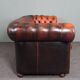 Chesterfield sofa in patinated orange leather, 2.5 seats