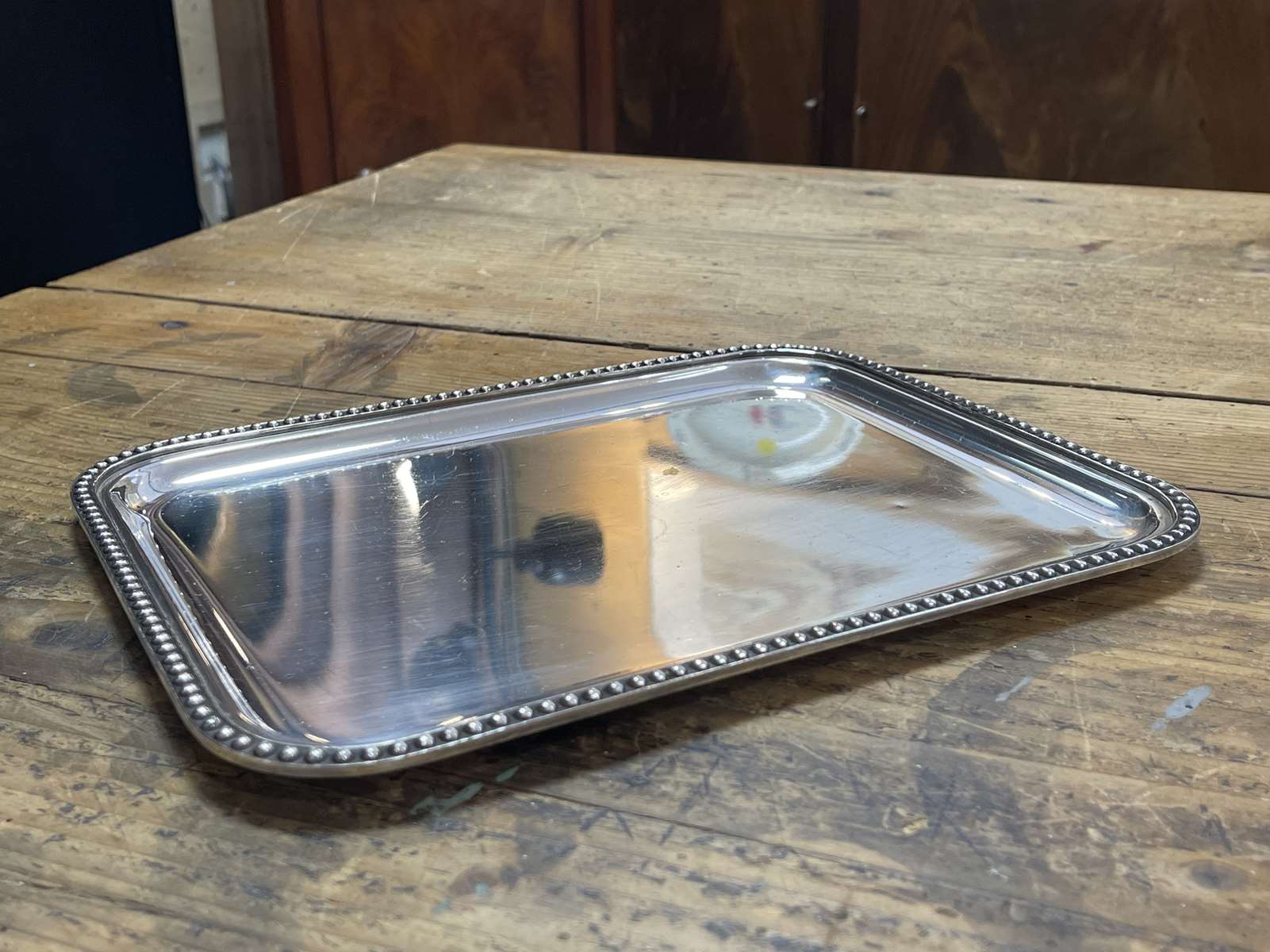 Small rectangular and beaded silver metal top