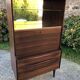 Vintage Scandinavian secretary in rosewood with drawers featuring fin-style handles.