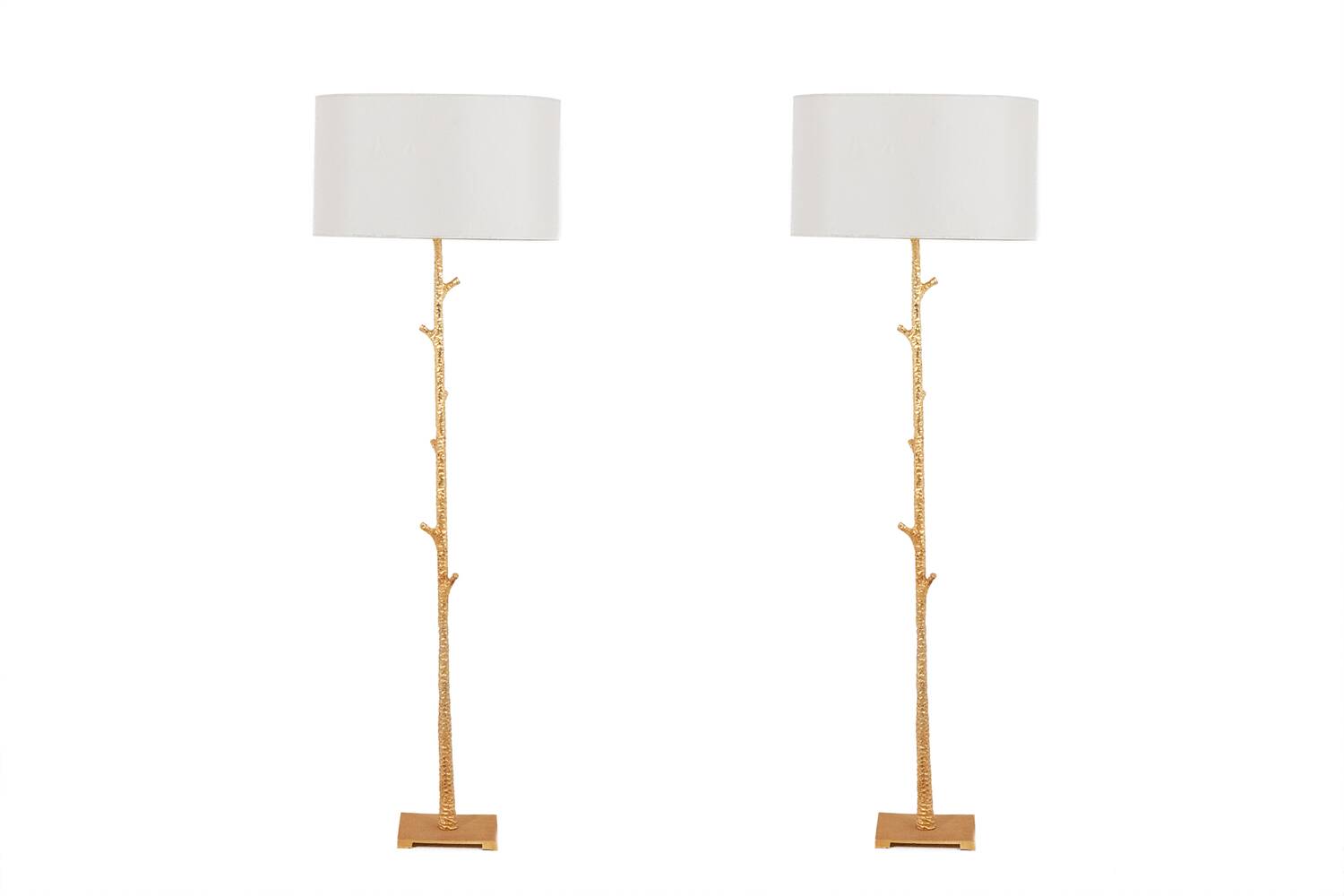 Pair of gilded metal floor lamps. 20th century.