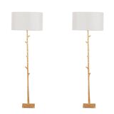 Pair of gilded metal floor lamps. 20th century.