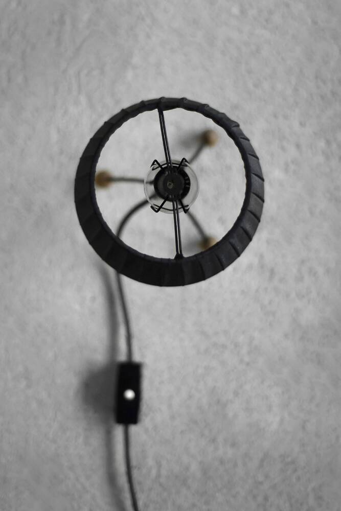 Small modern Polish table lamp from the mid-century with a black shade, 1960s.