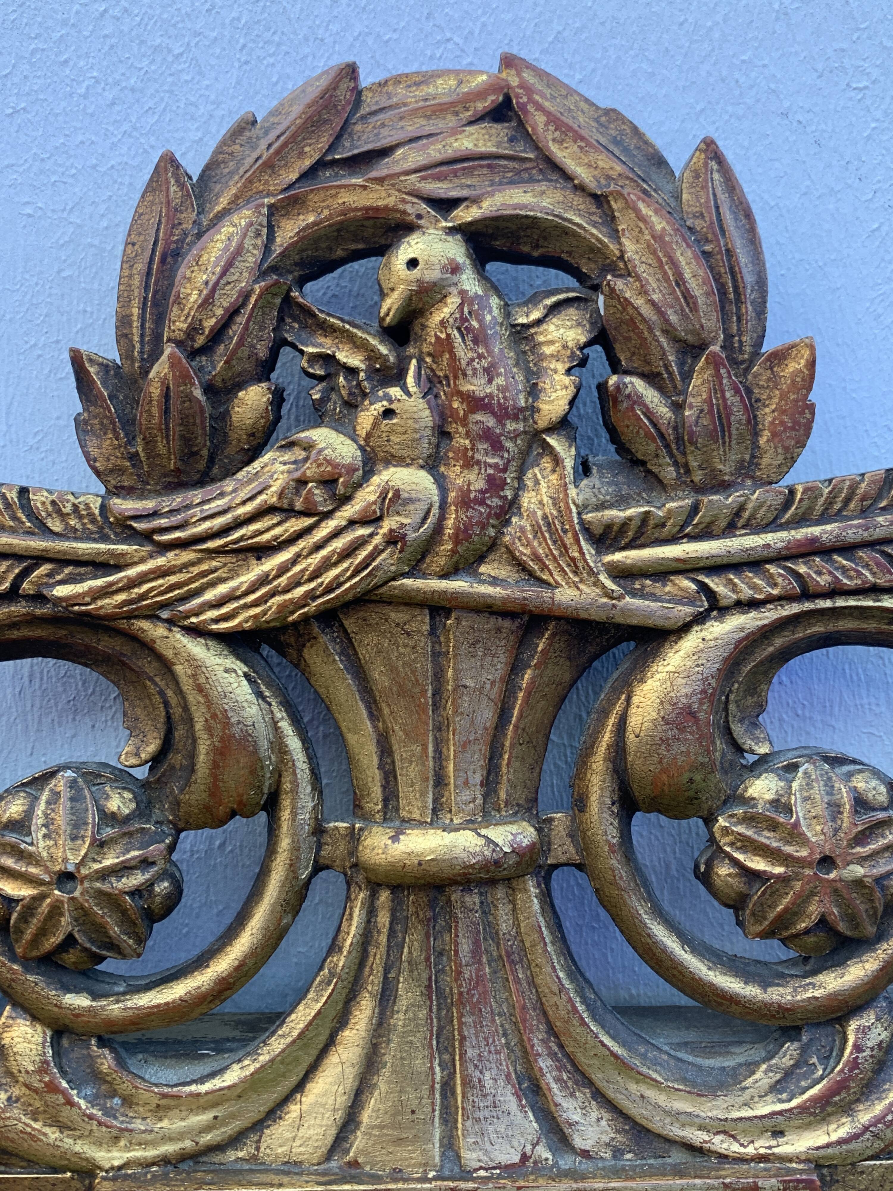 Antique mirror with gilded wood pediment, Louis XVI style