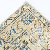 Tapis persan bleu et beige