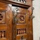 Important neo-Gothic entrance wardrobe in carved oak with chest.