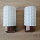 Philips wall sconces in wood and white opal.