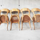 Suite de 4 chaises de bistrot Baumann 1950