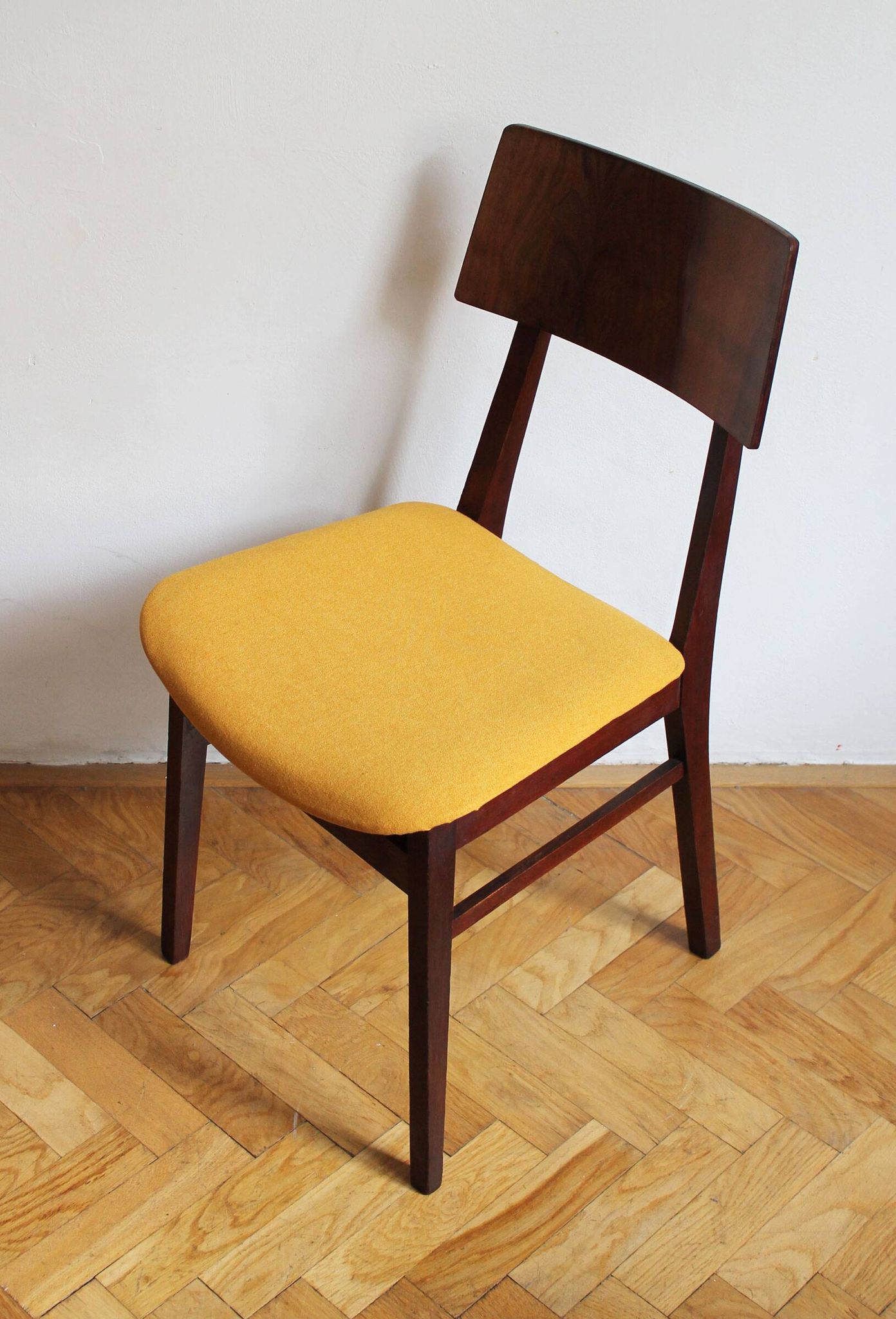 Vintage dining chair from the 1960s, Scandinavian style, wood and fabric.