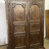 Louis XV carved wooden wardrobe from the 18th century