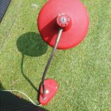 Red and silver swan neck table lamp