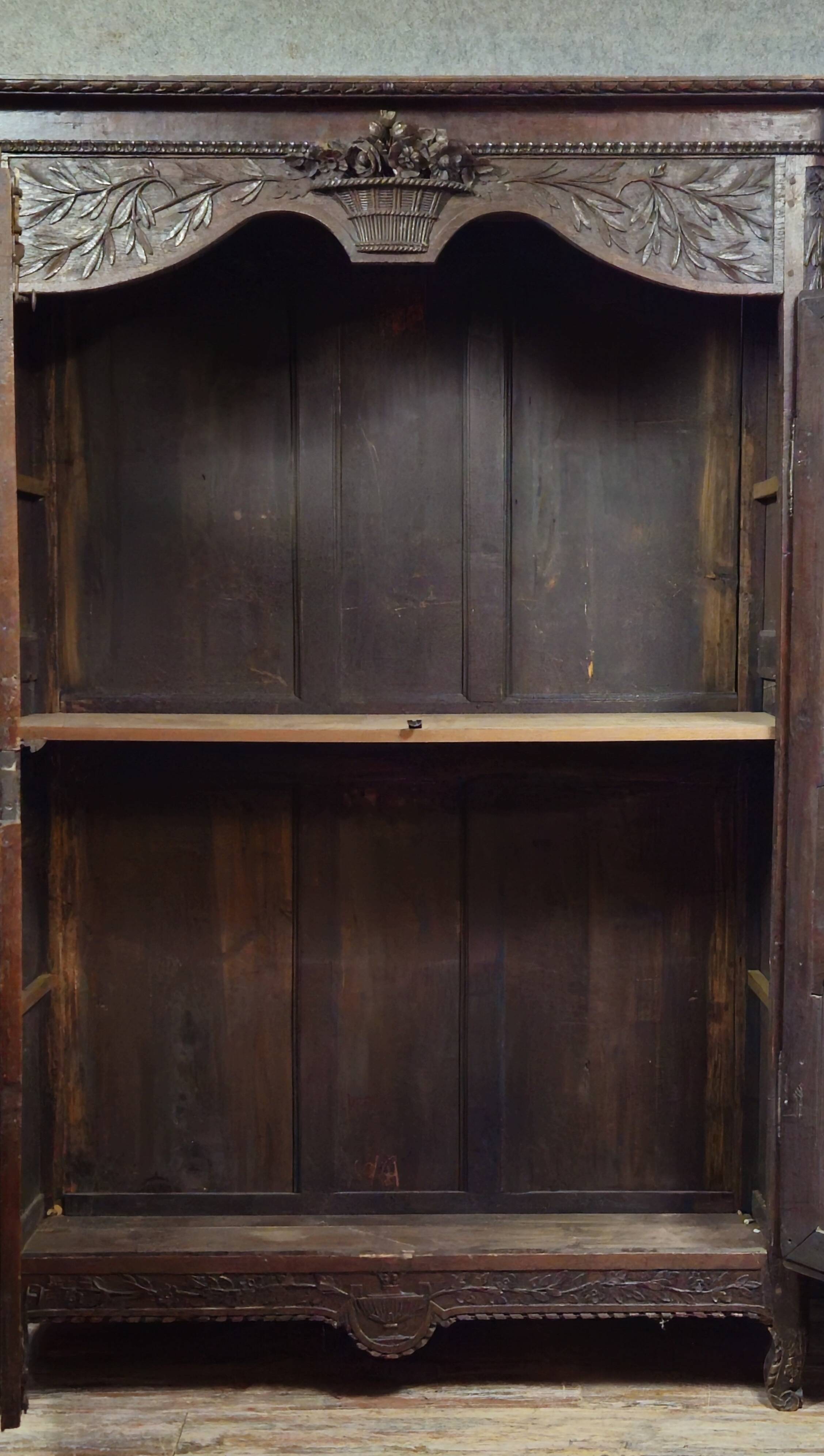 Large Norman wedding wardrobe in carved oak – Louis XV period