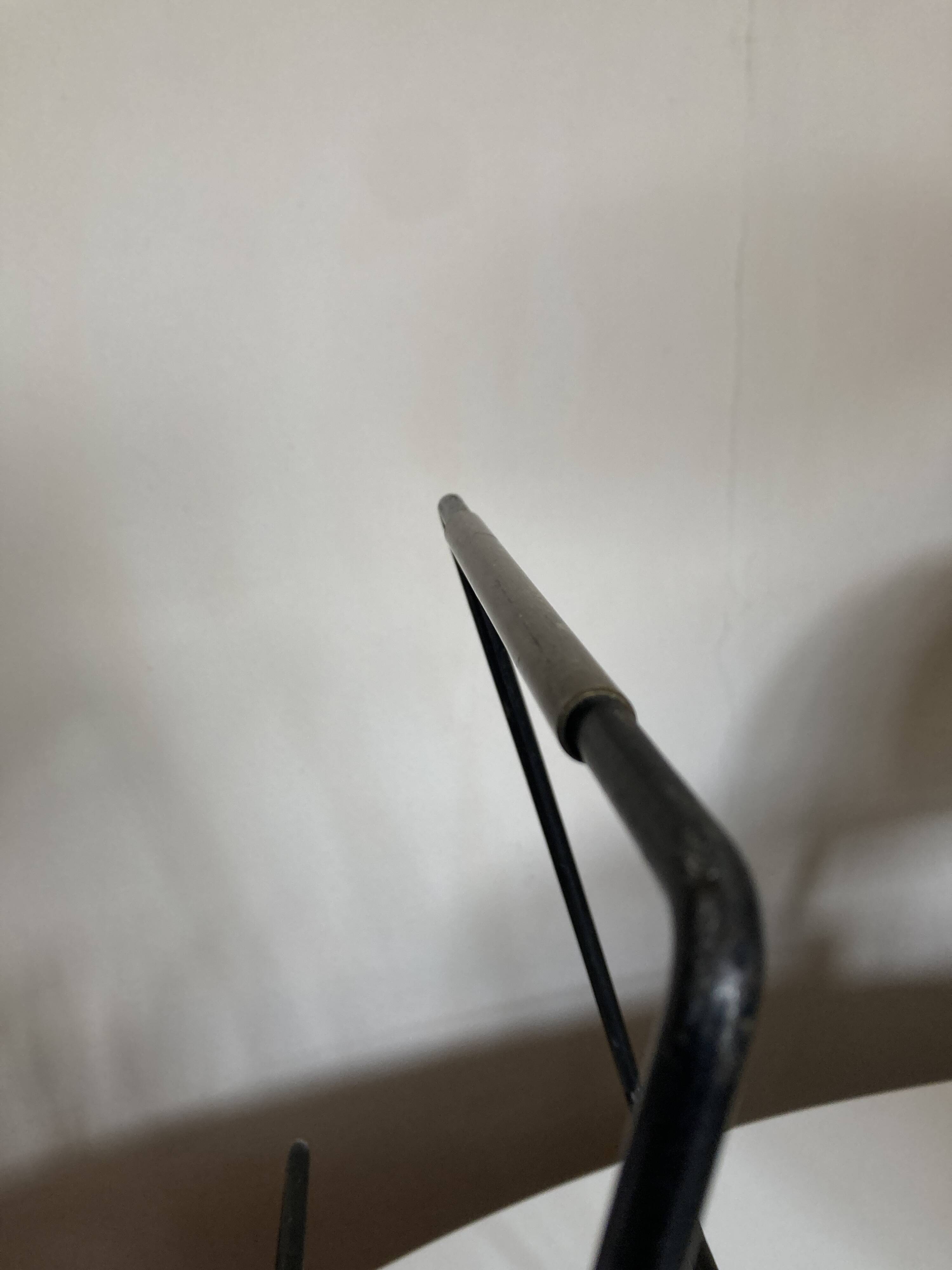 Modernist magazine rack French work 1950 in iron and brass