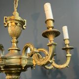 Important Louis XVI style chiseled bronze chandelier with 8 light arms by Lucien Gau