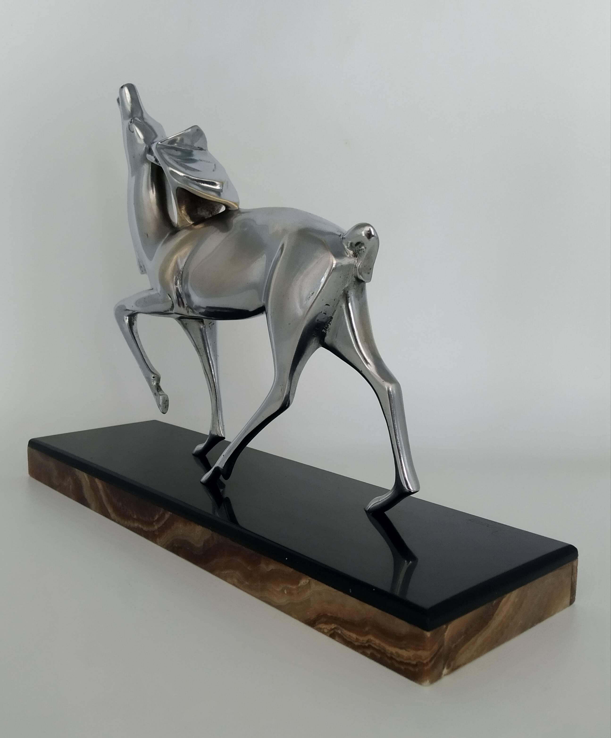 Silvered bronze sculpture signed by Michel Decoux.