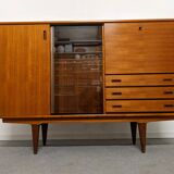 High sideboard, display cabinet and secretary, Scandinavian in teak, France around 1960.