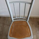 Low chair in wood and canework