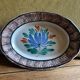 Ceramic plate, antique late 19th - early 20th century, known as "Cul-noir" from Normandy.