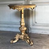 Carved gilded wooden gueridon, tabletop in marble marquetry.