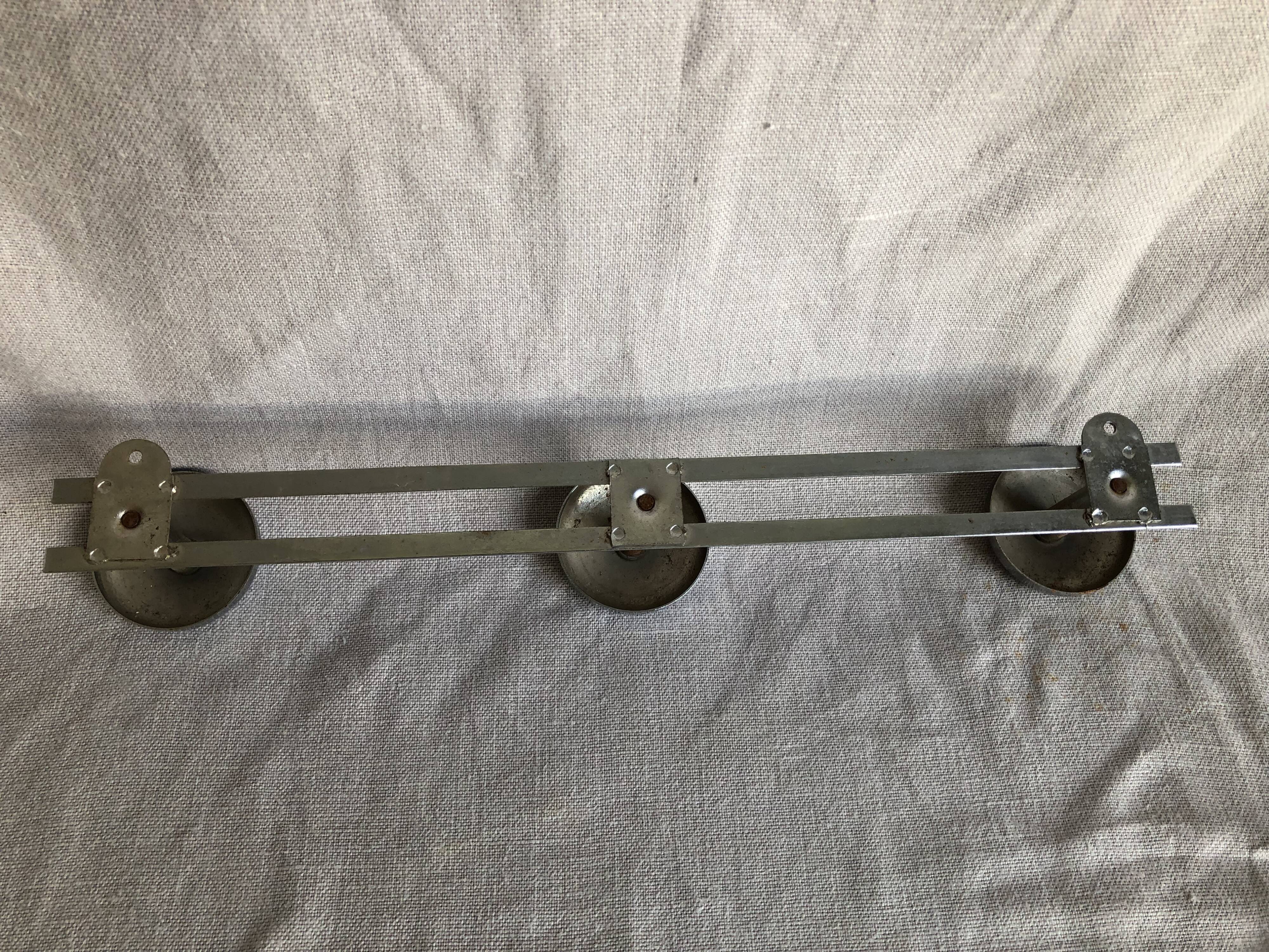 Metal wall coat rack