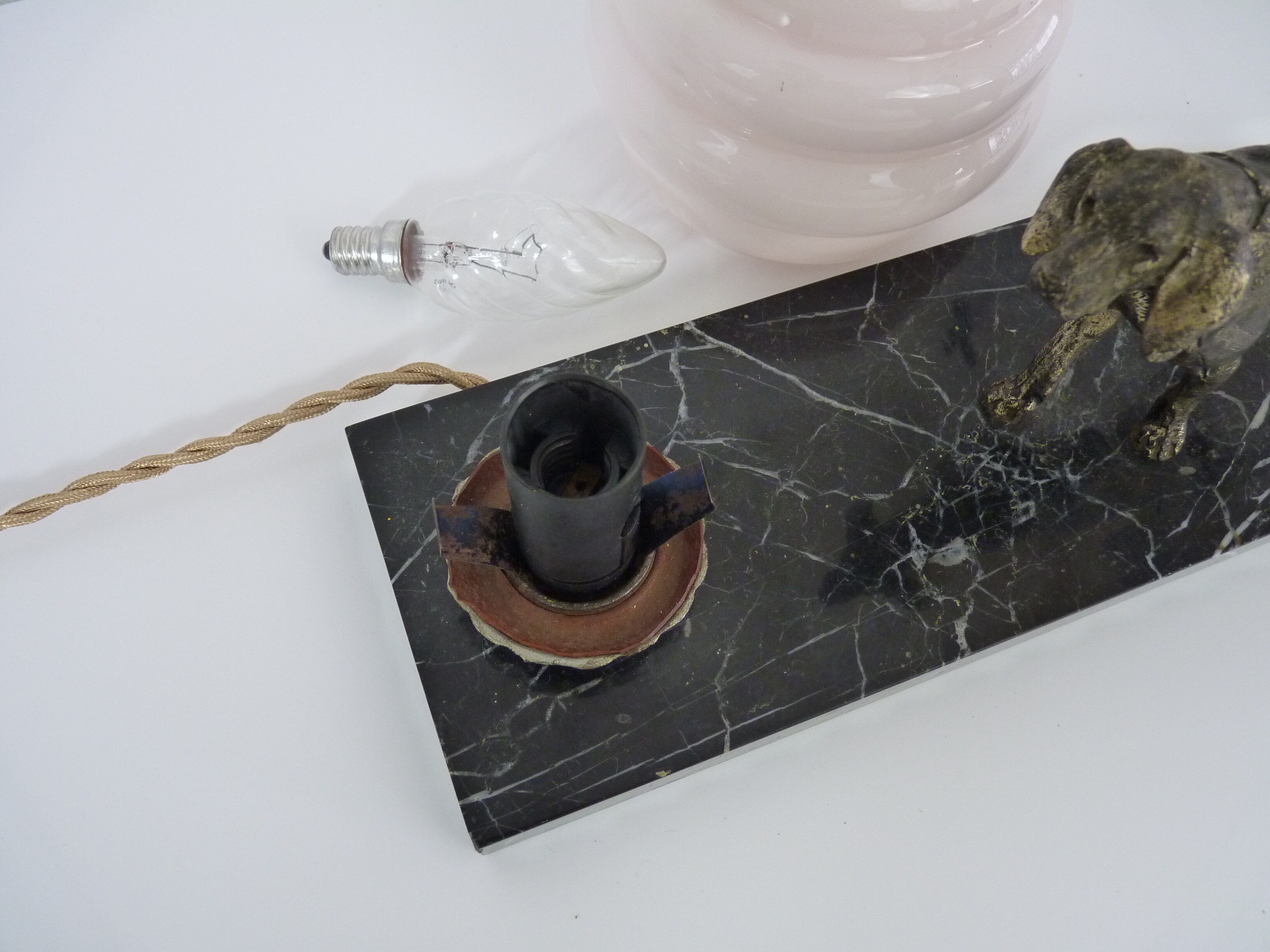 Lamp, Art Deco night light, dog on black marble base, pink globe. Year 30