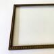 Wooden frame carved in beads, glazed, gray cardboard back and irzft paper