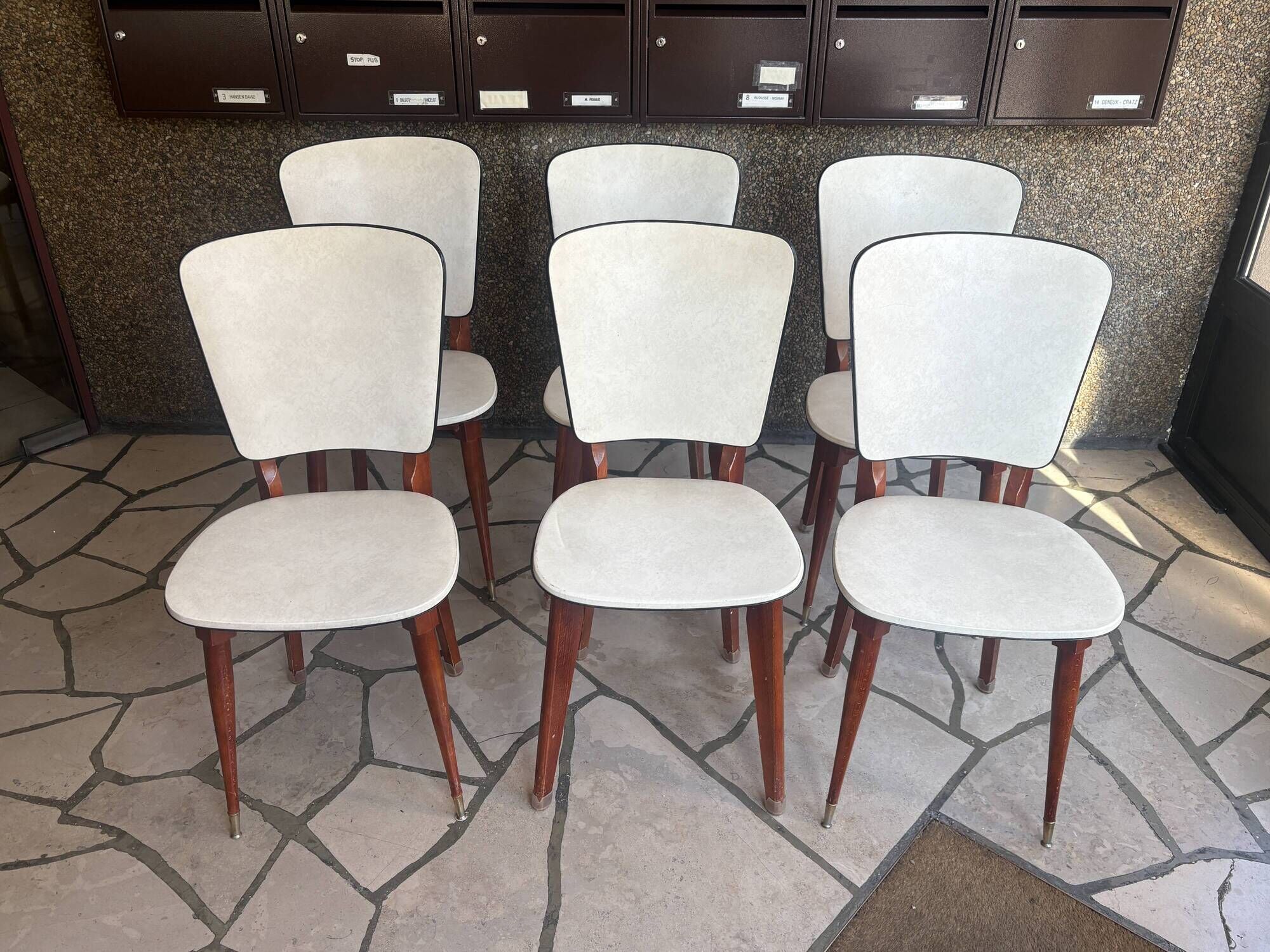 Set of mid-century Scandinavian-inspired chairs.