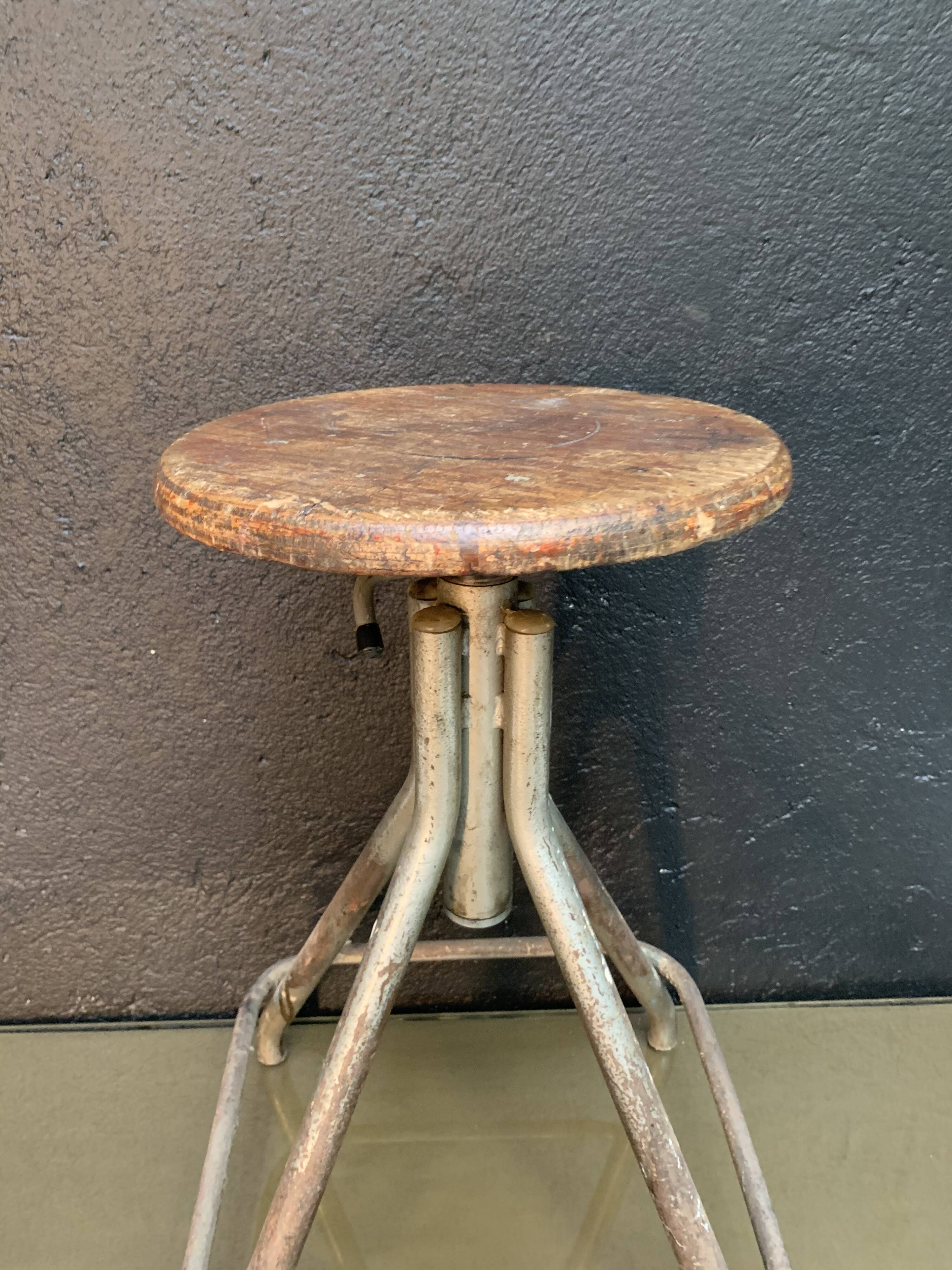 Old adjustable workshop stool