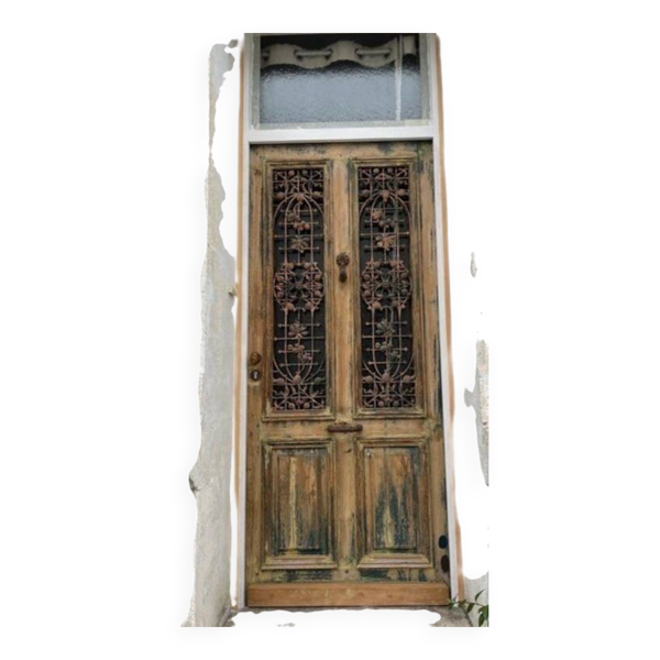 Porte d'entrée de maison ou immeuble de centre ville, avec heurtoir dauphin et cadre + imposte