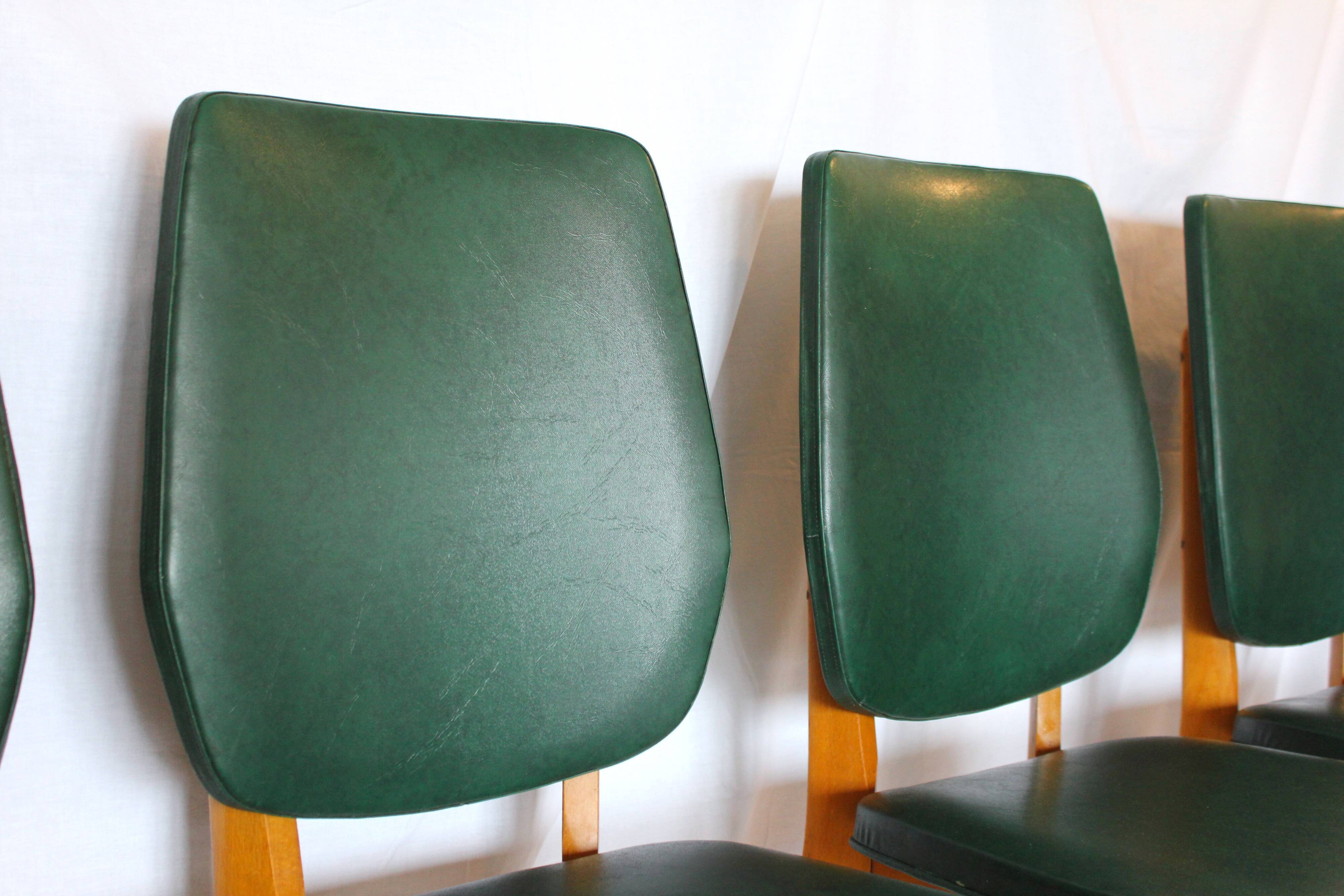 Set of 4 vintage chairs wood and skai green