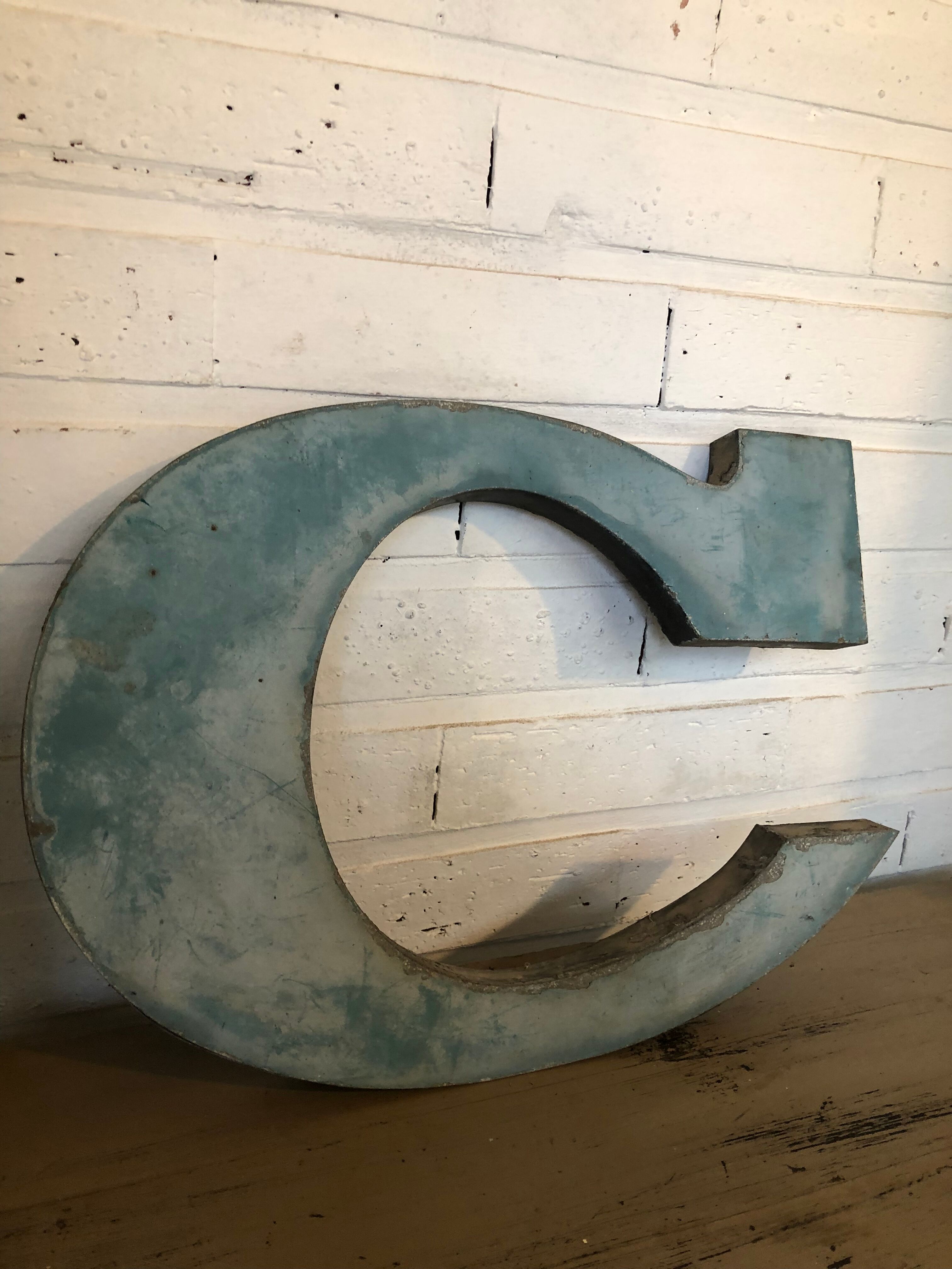 Blue sign letter "C"