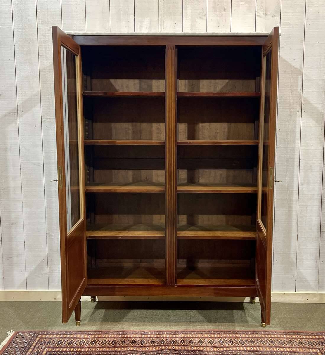 Louis XVI style bookcase in mahogany and marble top from the 70s