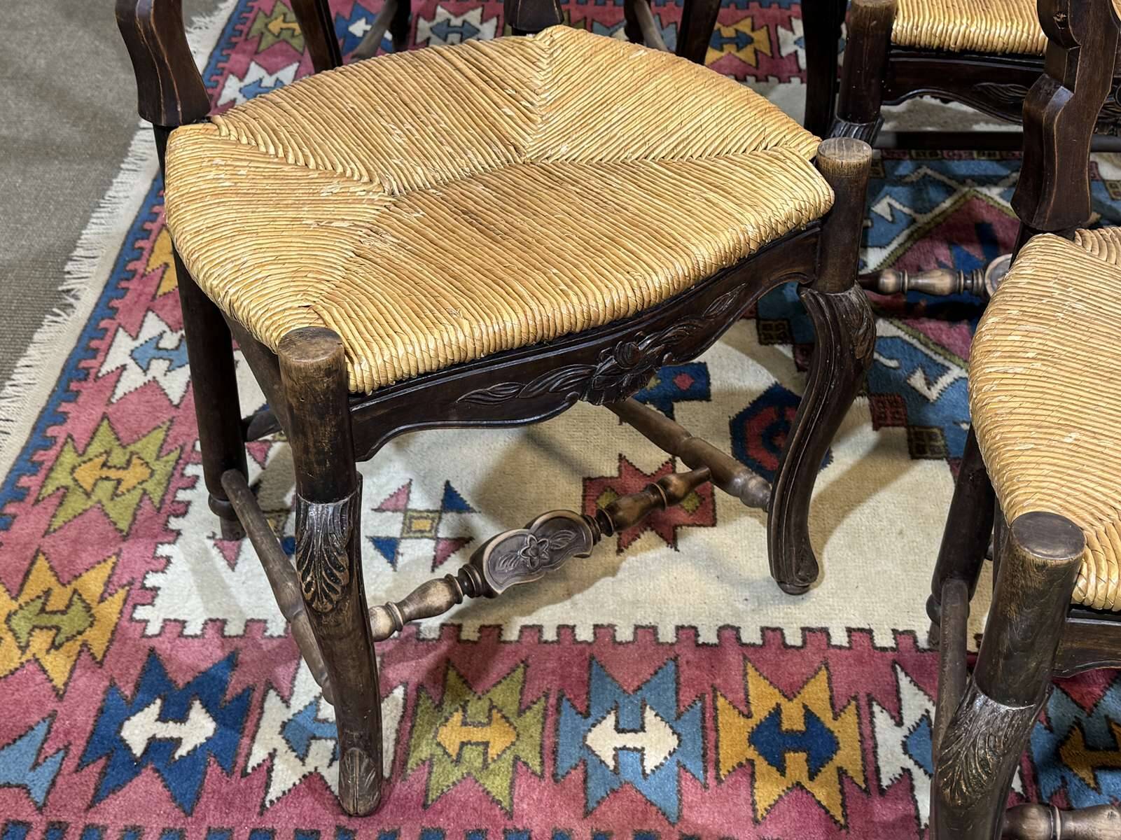 Set of 7 Louis XV style beech chairs with straw seats.