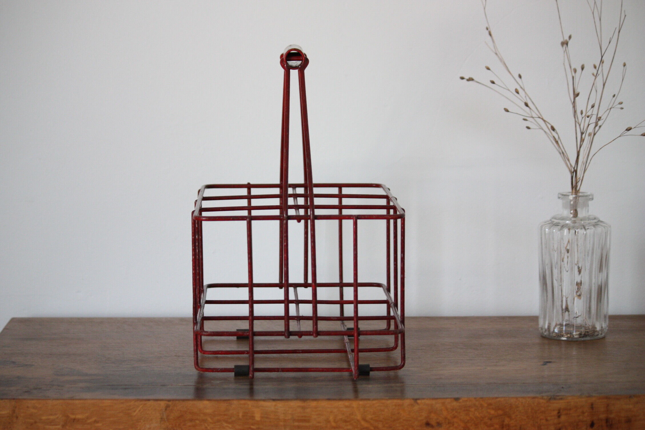 Red metal bottle holder