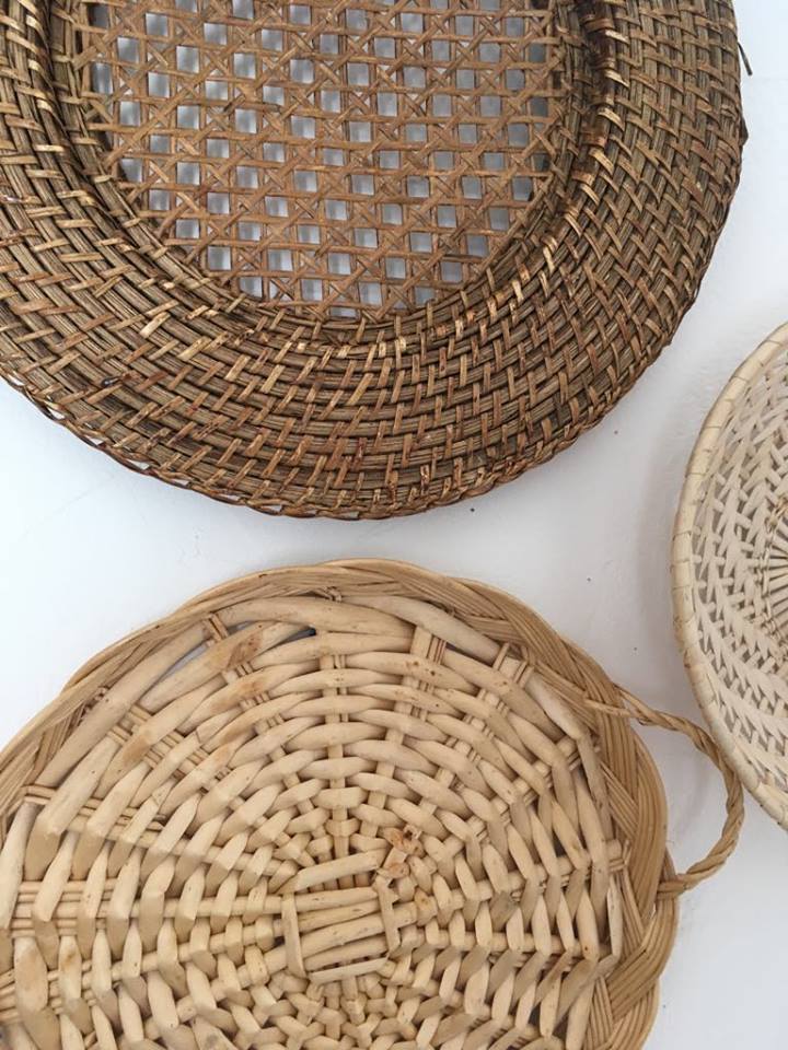 Wall composition of baskets and braided wicker trays
