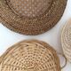 Wall composition of baskets and braided wicker trays