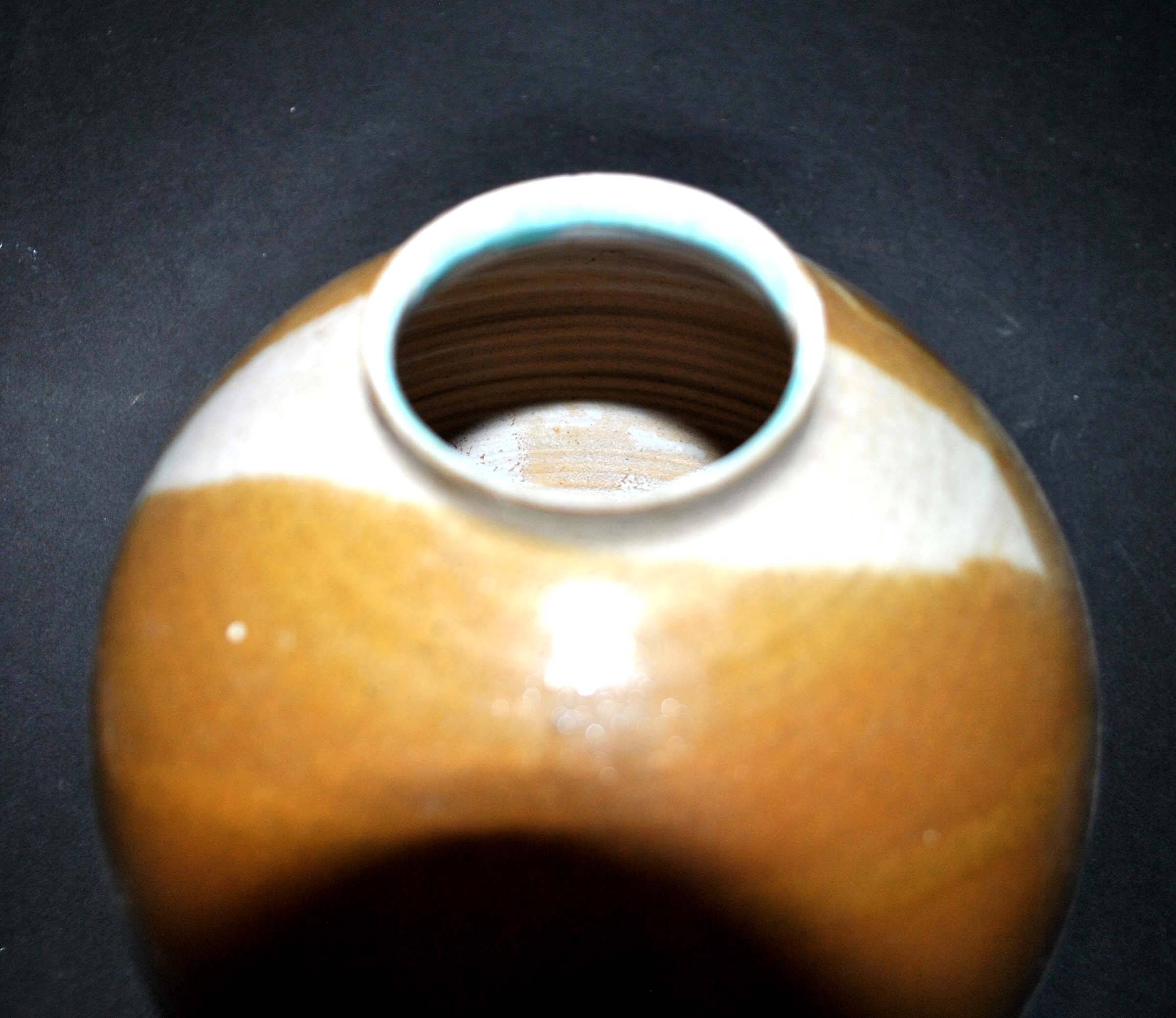 Vintage ball vase in flamed stoneware 1960 - caramel color with blue flow - signed DS