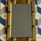 Miroir aspect bambou doré Italie 1970