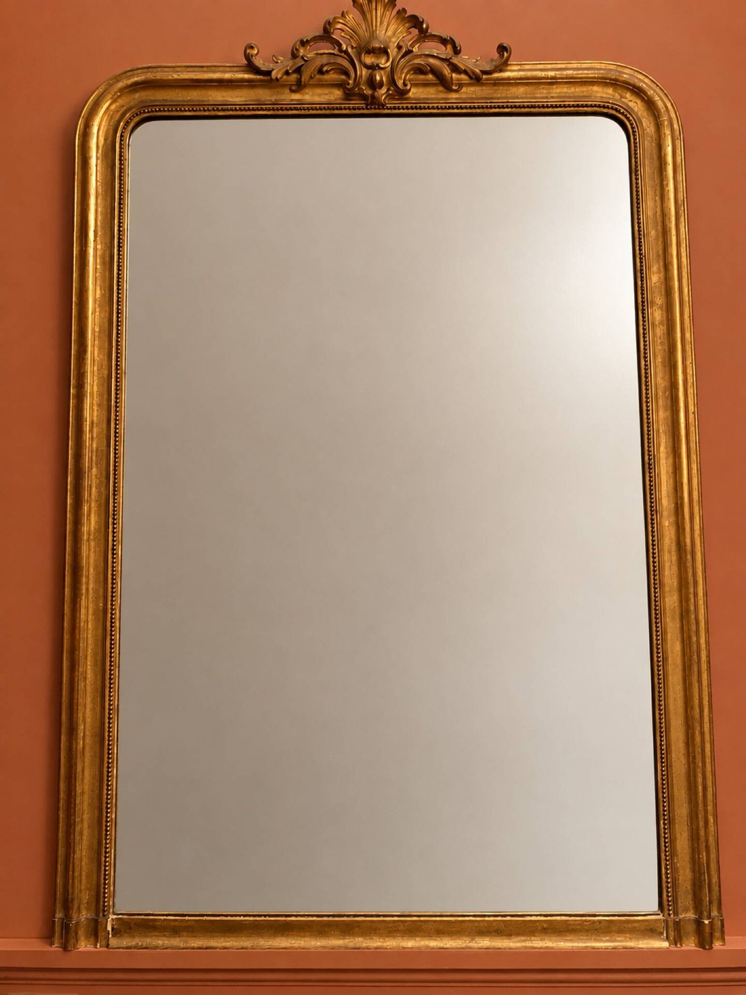 Antique gilded wooden mirror