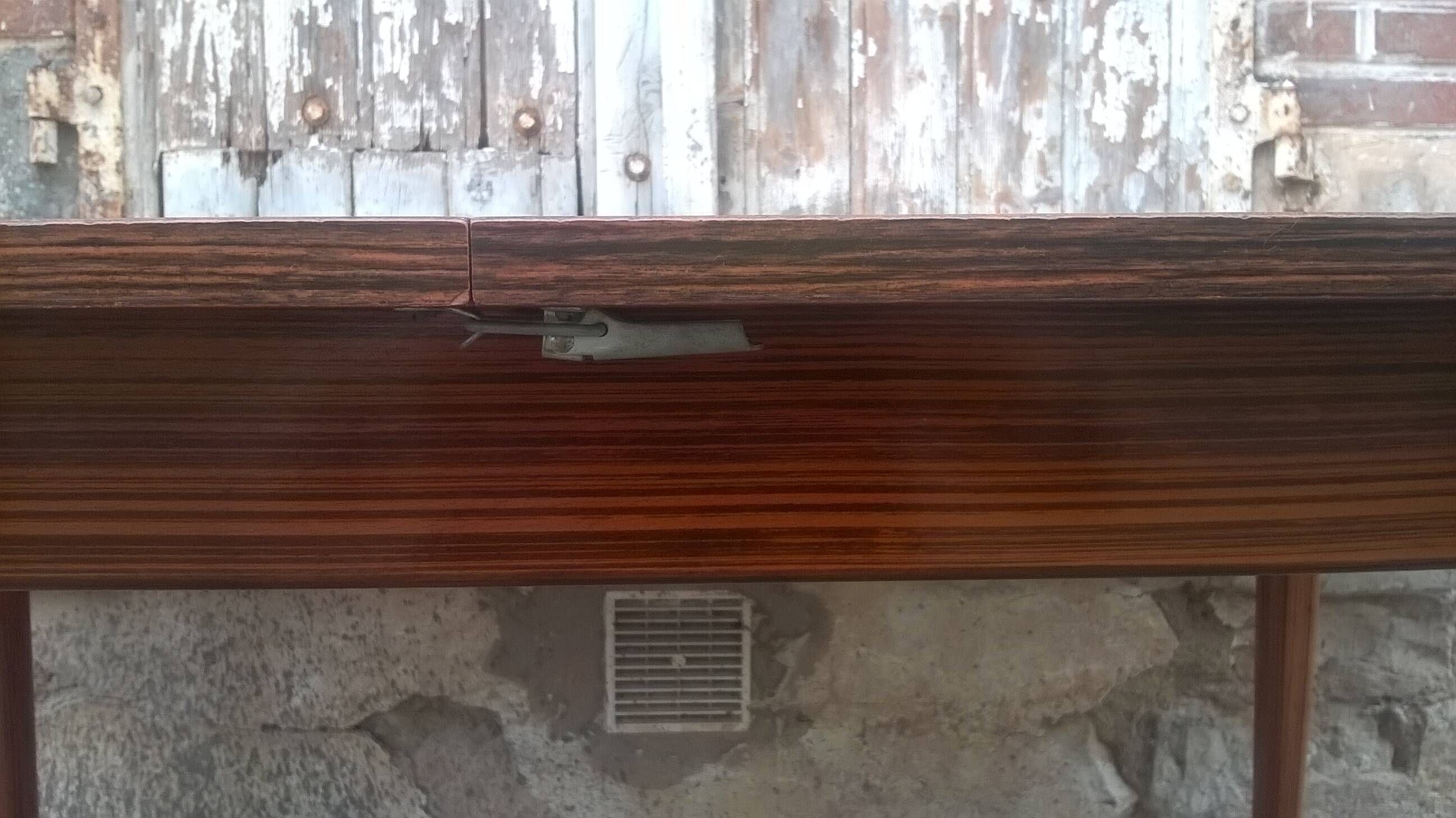 Extendable teak dining table