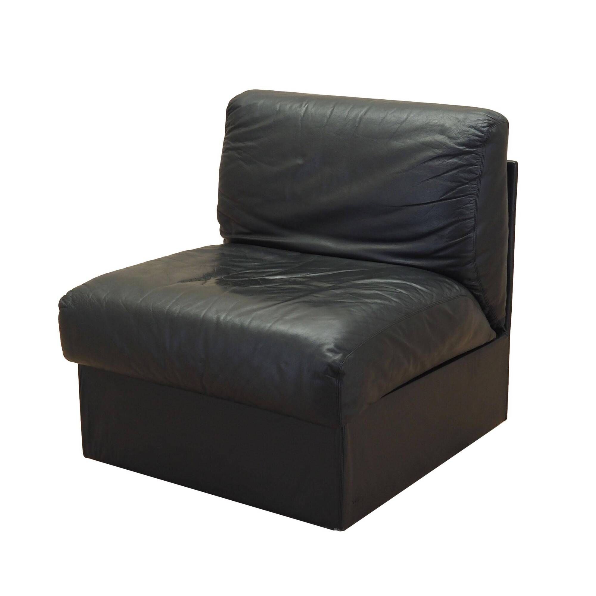 Black leather pouf/armchair, Italian design, 1960s, made in Italy.